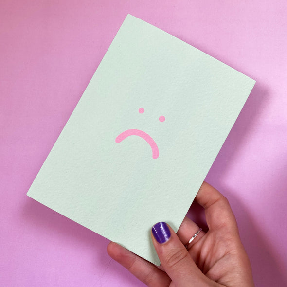 Sad face card